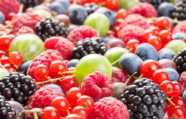 fresh fruits and berries as textured background