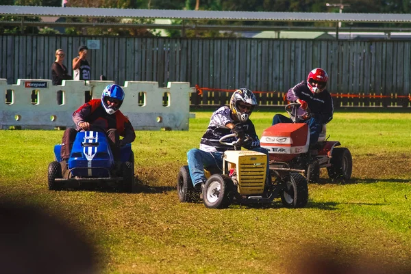 Drivers on trimmed lawnmowers — Stock Photo, Image