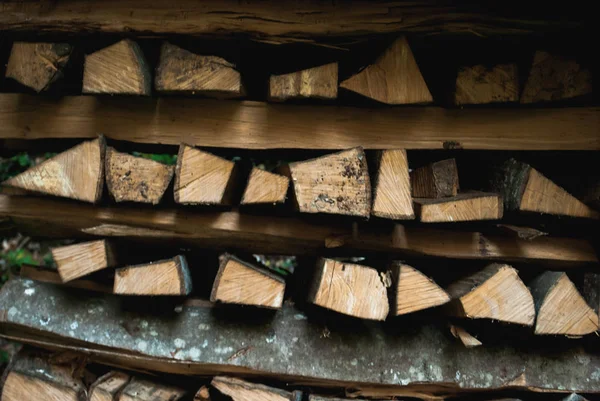 Stacked up triangle firewood — Stock Photo, Image