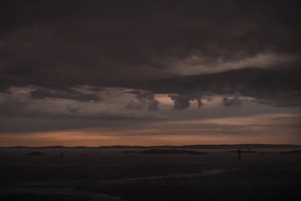 Stormy clouds by the ocean — Stock Photo, Image