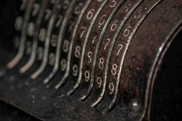 An old vintage cash register with lots of numbers — Stock Photo, Image