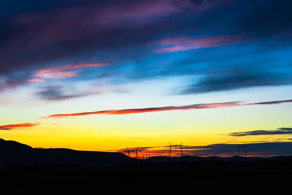 Величественные Закат Восход Солнца Небо Электрические Полюса — стоковое фото