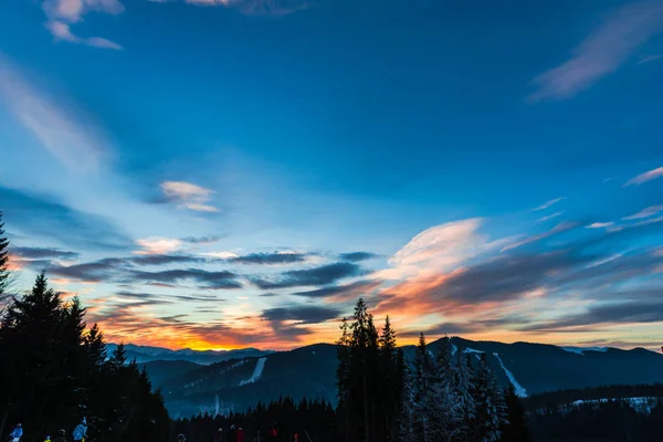 beautiful sunset sky in mountains, Winter sunset in Carpathian mountains