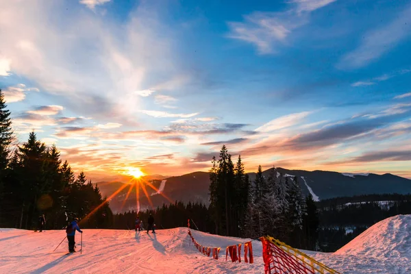 beautiful sunset sky in mountains, Winter sunset in Carpathian mountains