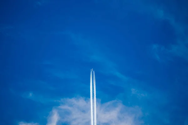Blue sky with plane trace