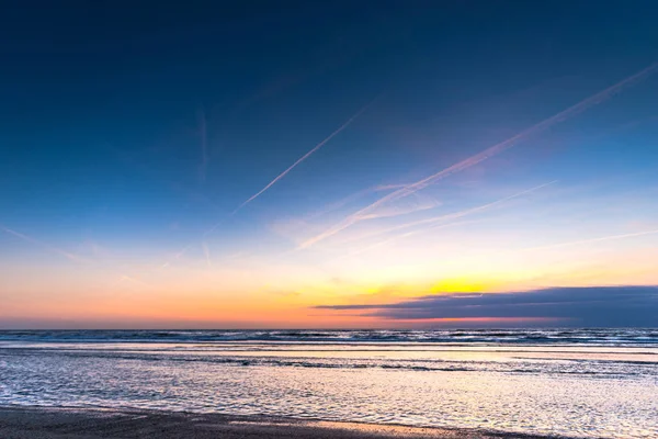 twilight sky and ocean water surface, horizon