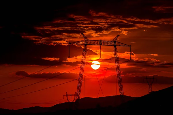 Heldere Zonsondergang Lucht Elektrische Palen — Stockfoto