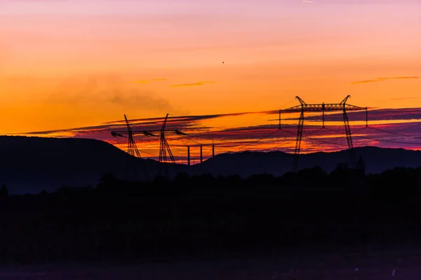 Pole Biegunów Elektrycznych Tle Nieba Zachód Słońca — Zdjęcie stockowe