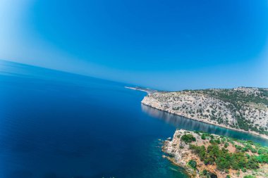 mavi deniz suyu ve ada peyzaj, eğrisi fotoğraf 