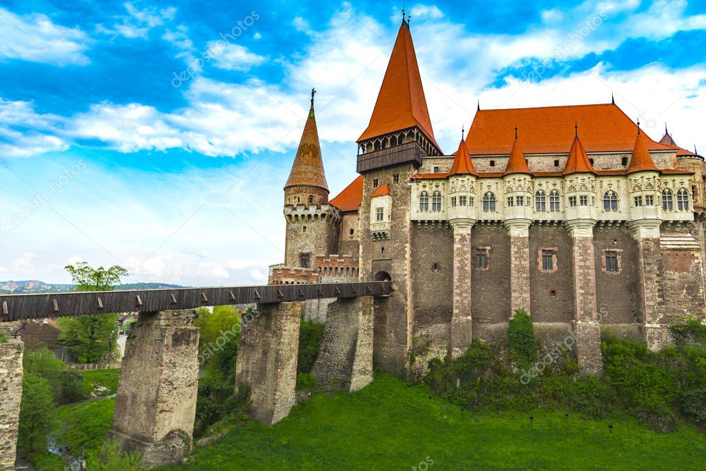 aged Corvinesti Castle and brick bridge