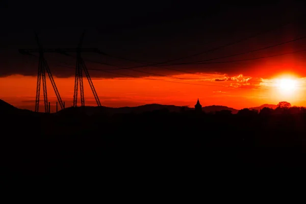 Pole Biegunów Elektryczności Niebo Zachód Słońca Tle — Zdjęcie stockowe