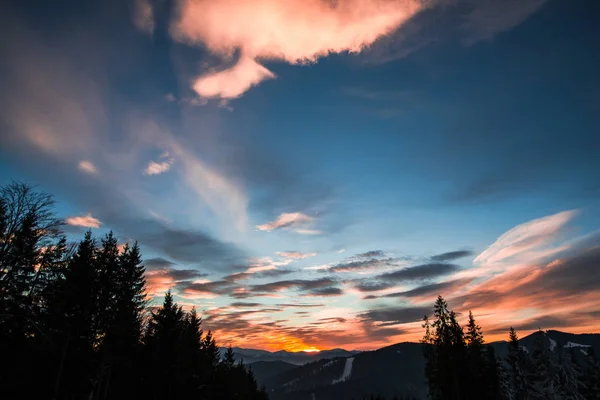 beautiful sunset sky in mountains, Winter sunset in Carpathian mountains