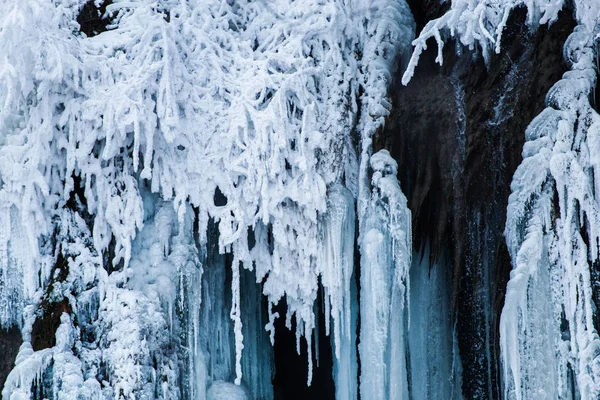 Frozen waterfall and icicles, frozen water