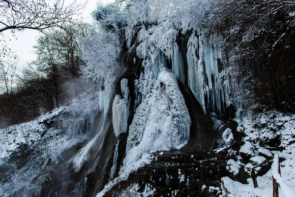 Frozen waterfall and icicles, frozen water