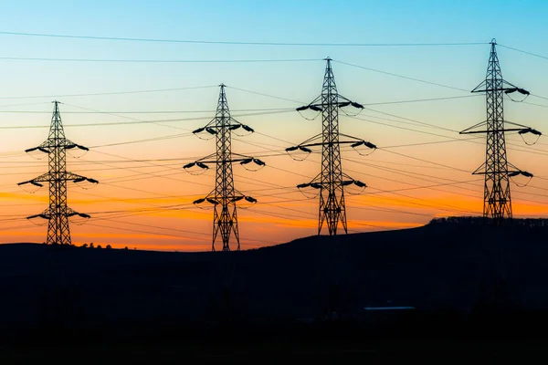 Céu Pôr Sol Laranja Brilhante Pólos Elétricos — Fotografia de Stock