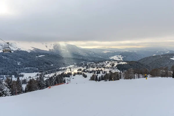 ski resort in winter mountains, ski slope