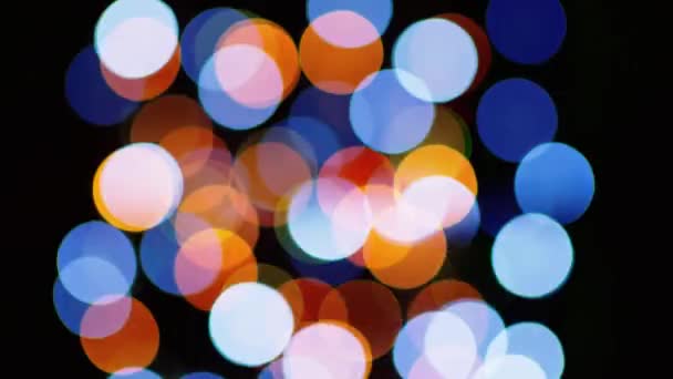 Bokeh Parpadeante Multicolor Sobre Fondo Negro Las Luces Año Nuevo — Vídeo de stock