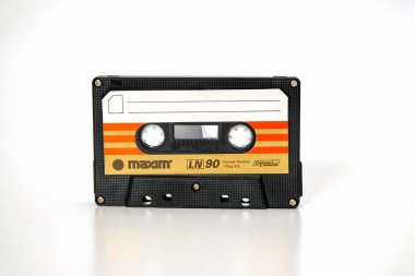 PRAGUE, CZECH REPUBLIC - NOVEMBER 29, 2018: Audio compact cassette Maxim LN 90. Audio cassette on a white background, front view. analog format for audio playing and recording.