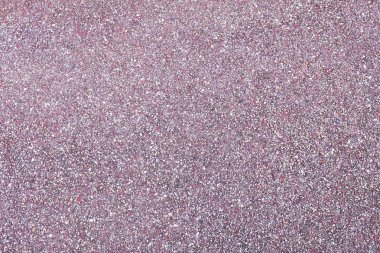 Mor asfalt kaplama doku arka plan. Tasarım küçük taşlarla yakın çekim.