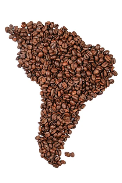 Gehele bonen koffie. De omtrek van het vasteland van Zuid-Amerika is gemaakt van koffiebonen isolaat op witte achtergrond. — Stockfoto
