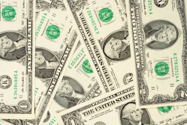 Bir ve iki dolar banknotlar arka plan. Yüksek çözünürlüklü fotoğraf yakın çekim makro.