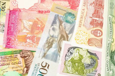 Çeşitli egzotik ülkelerden eski banknotlar. Renkli para geri. Yakın çekim makro.