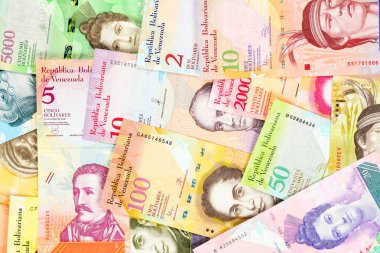 Venezuela bolivar banknotları, farklı banknotlar. Güzel renkli obverse yan bolivares arka plan kadar yakın.