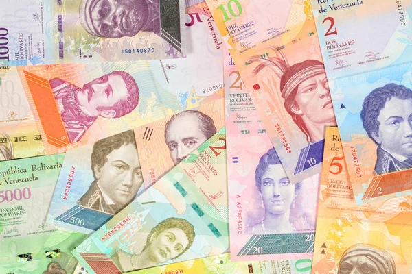 Venezuela bolivar banknotes, different bills of fuerte and soberano series. Venezuelan bolivar fuerte. beautiful colorful obverse side bolivares close up background.