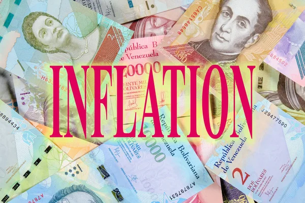 Concept of inflation in Venezuela. Bolivar paper money. Beautiful colorful bolivares close up background with title Inflation.