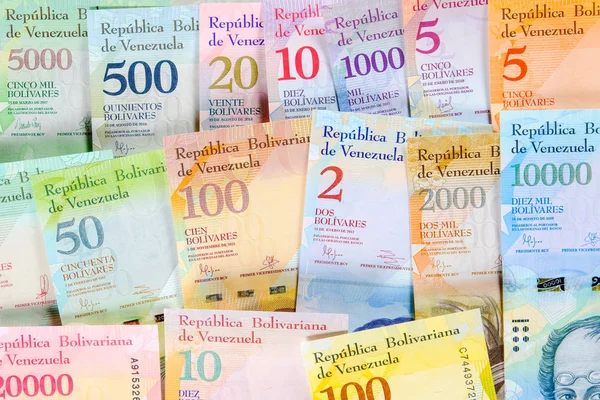 Venezuela bolivar banknotes, bills of different years. Venezuelan bolivar bills. beautiful colorful bolivares close up background.