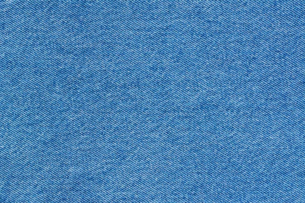 Jeans background denim pattern. Classic blue stonewashed fabric texture. Background of jeans canvas close up. — Stock Photo, Image