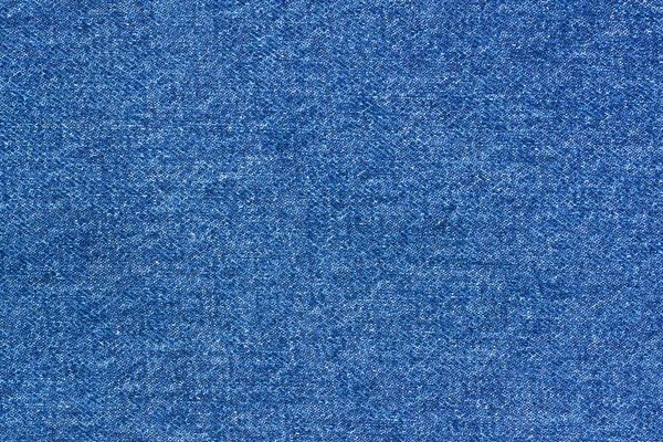 Jeans fundo padrão de ganga. Clássico azul escuro stonewashed textura de tecido. Fundo de jeans lona close-up . — Fotografia de Stock