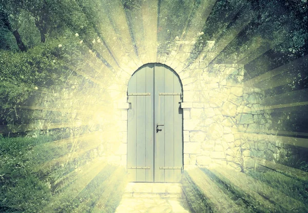 Door of the heaven in a dreamy rosegarden  with sunbeam