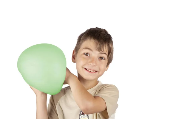 Vrolijke Jongen Houdt Een Groene Slime Ballon Studio Opname Geïsoleerd — Stockfoto