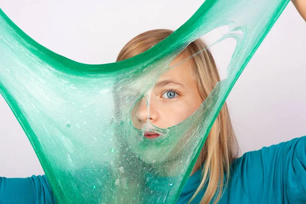 Beautiful Girl Holding Green Slime Looking Its Hole — Stock Photo, Image
