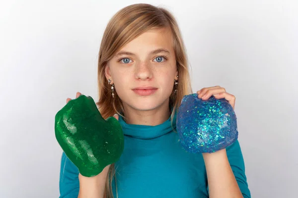 Young Girl Showing Green Blue Slime — Stock Photo, Image