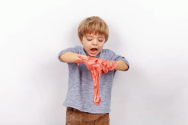 Cute Small Boy Playing Slime Looks Red Gunk — Stock Photo, Image