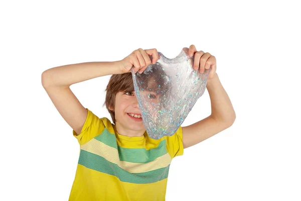 Cheerful Boy Holding Glitter Slime Front Him Isolated White Background — Stock Photo, Image