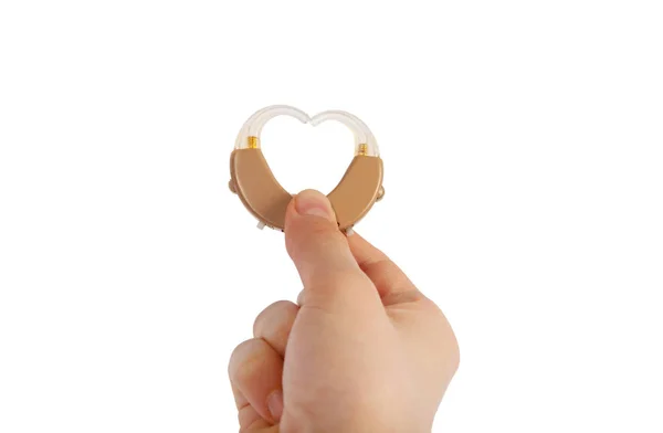 Forma del corazón a partir de audífonos formados por una mano aislada en blanco —  Fotos de Stock