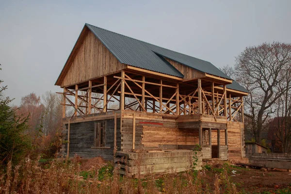 Wooden construction of the house in the daytime outside view — Stock Photo, Image