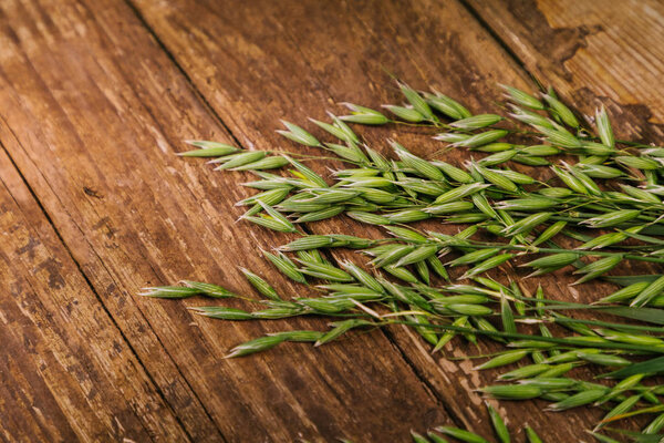 green oats on an old wooden table