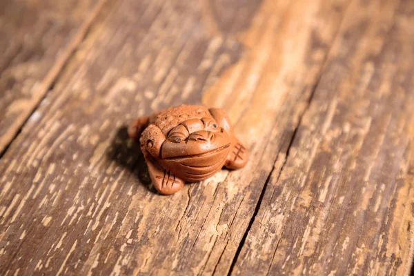 Chinese Frog Little Figurine Keychain On An Old Wooden Table Stock Images Page Everypixel