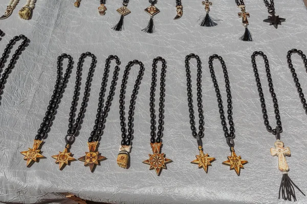 Original chains and pendants in the daytime at the bazaar — Stock Photo, Image