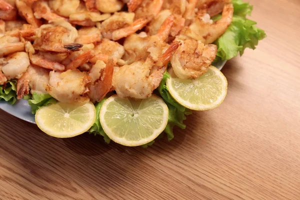 Fried Shrimp in batter on plates with lemon — Stock Photo, Image