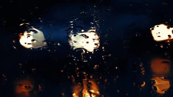 Raindrops on the car window close up — Stock Video