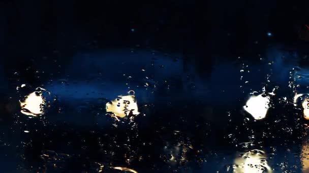 Raindrops on the car window close up — Stock Video