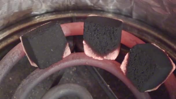 Coconut coal for hookah warmed up timelapse video — Stock Video