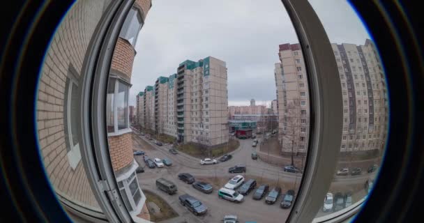 Timelapse video in the courtyard of multi-storey buildings. Optical effect circular fish lens — Stock Video