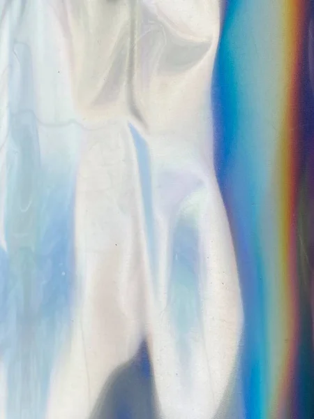 Голографический фон из радужной фольги — стоковое фото