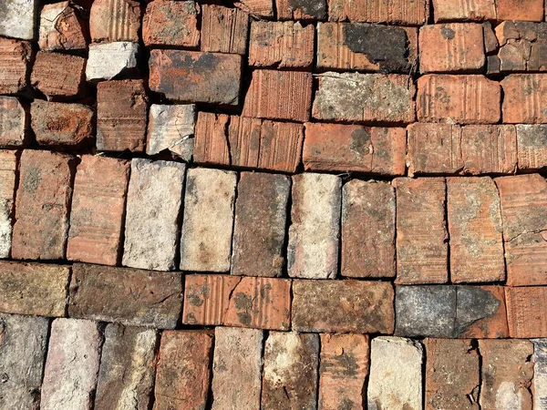 red old bricks laid in one plane